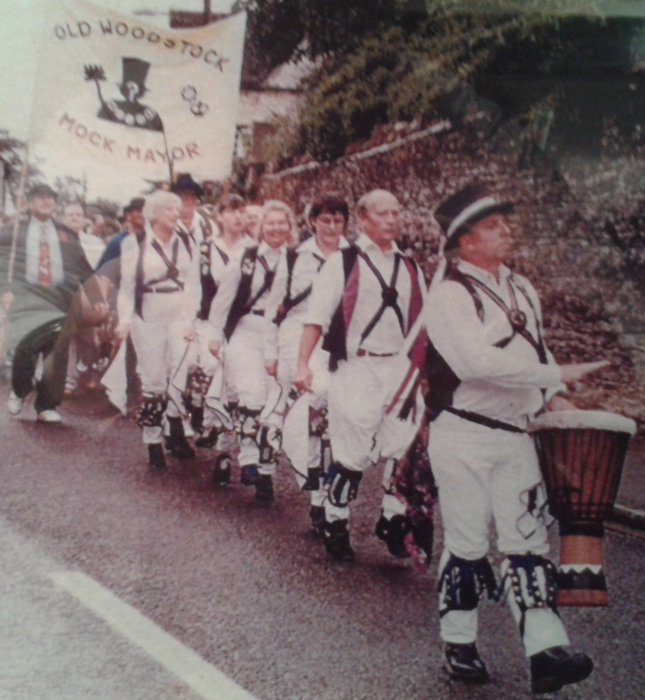 A photograph of Cry Havoc leading the Old Woodstock Mock Mayor procession in an unknown year.