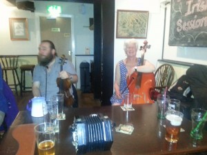 Friday night session at the Harp in Glasbury. Mick and Jane take a break.